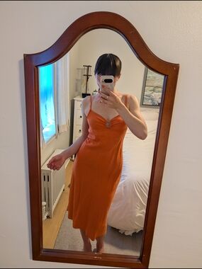 Sleek Orange Slip Dress with Ring Detail